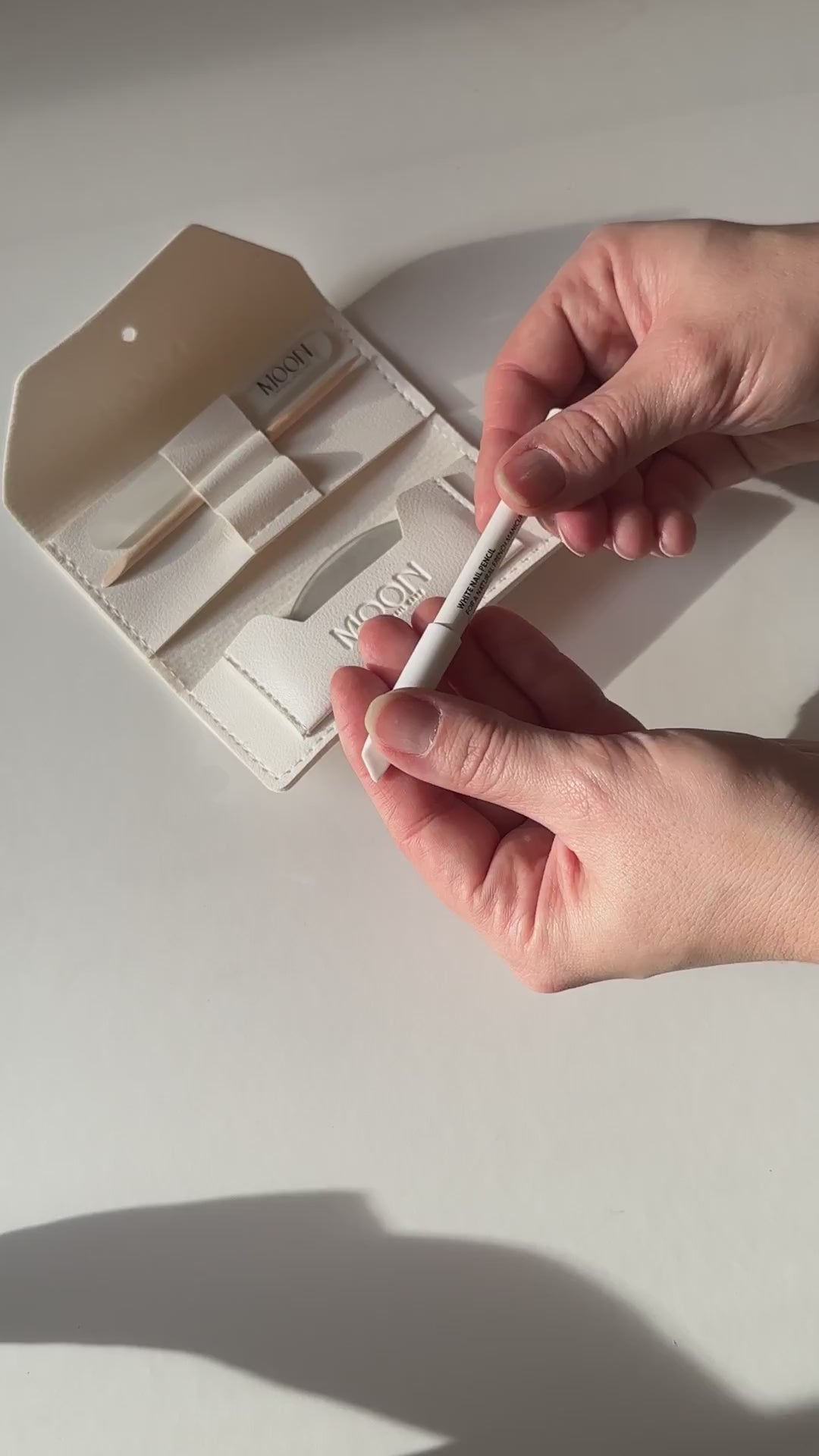 Applying White Nail Pencil